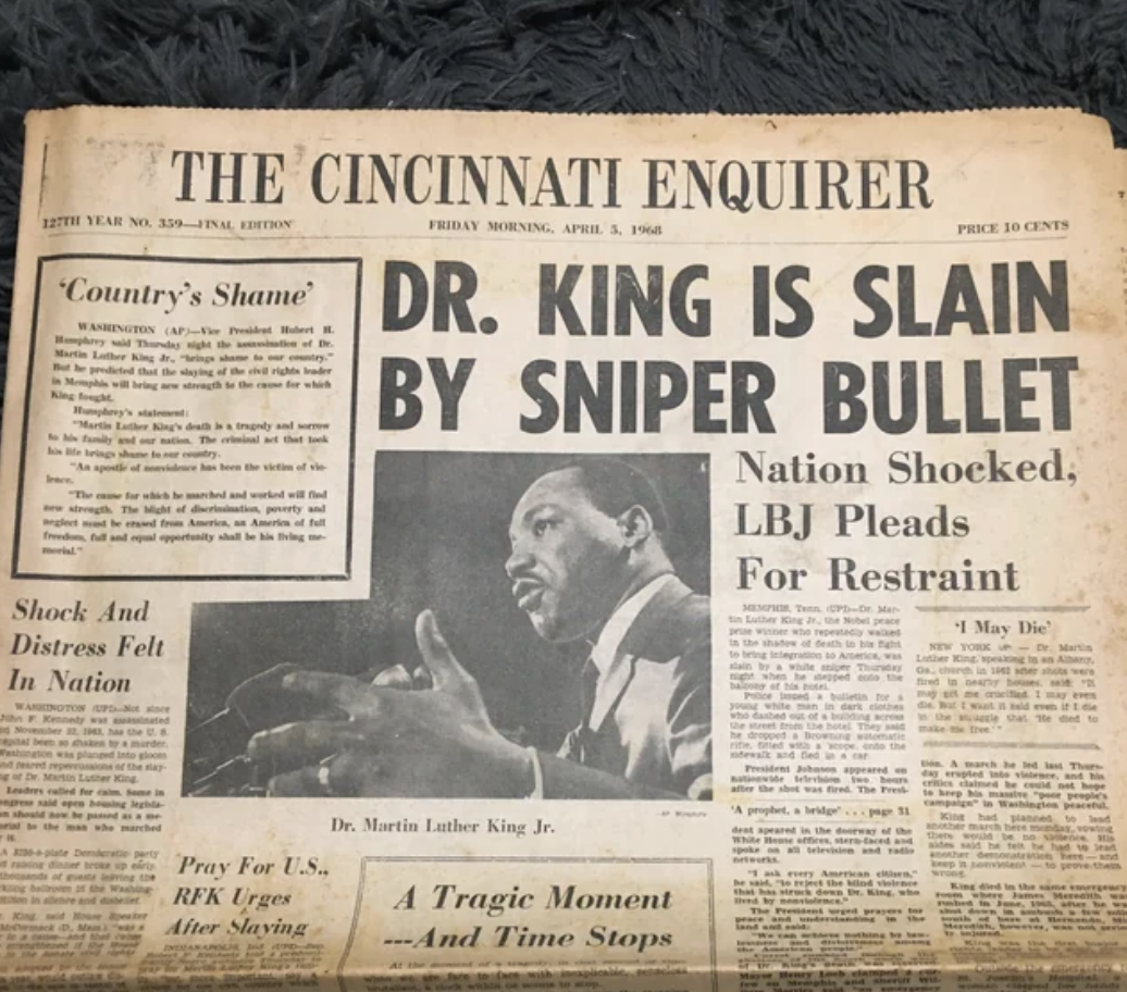 headline reads, dr king is slain by sniper bullet