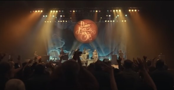 The band on stage in the show
