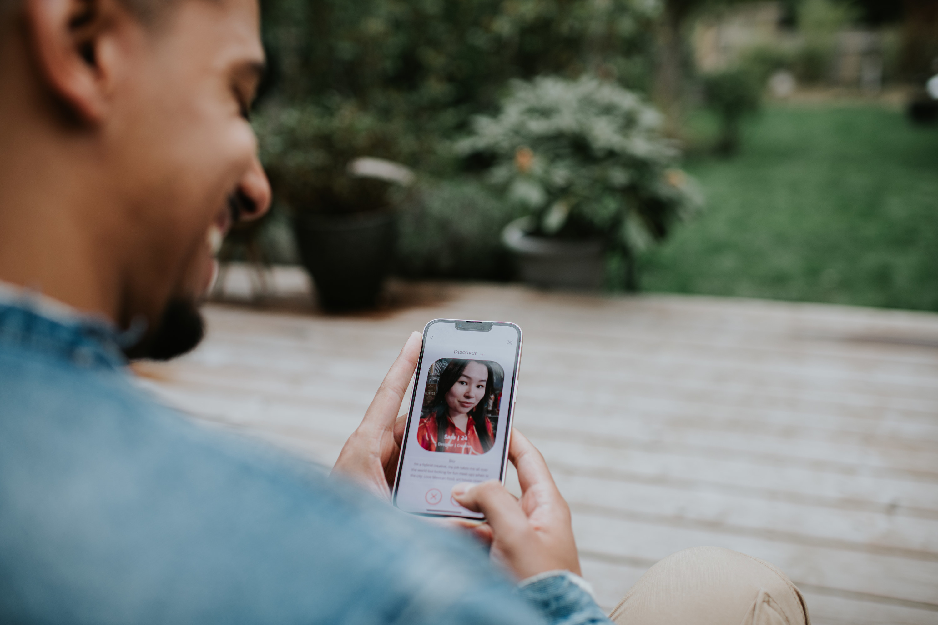 a man scrolling on a dating app