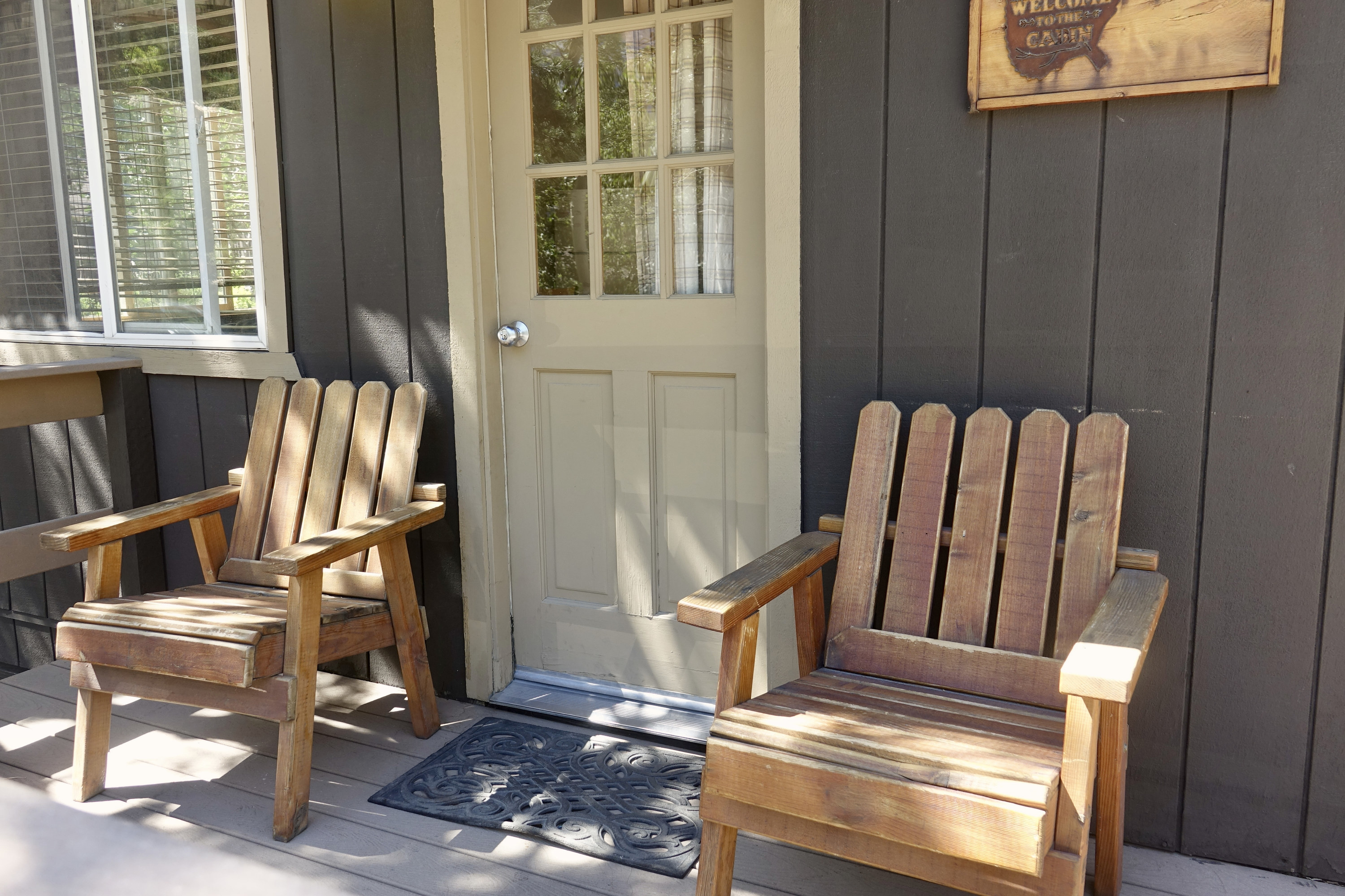 Two chairs on a front porch