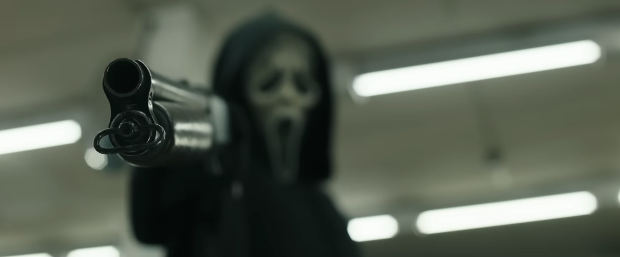 ghostface with a sawed off shotgun in scream vi