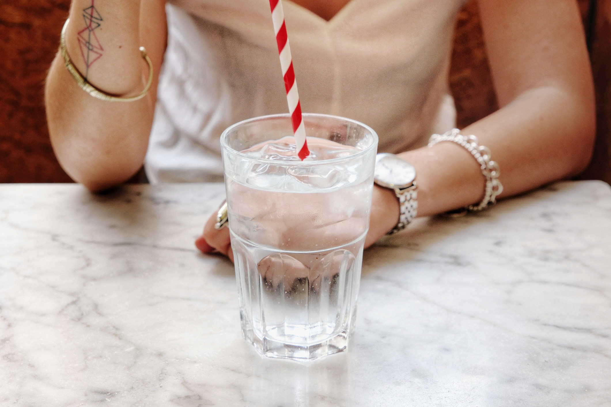A glass of iced water on a table