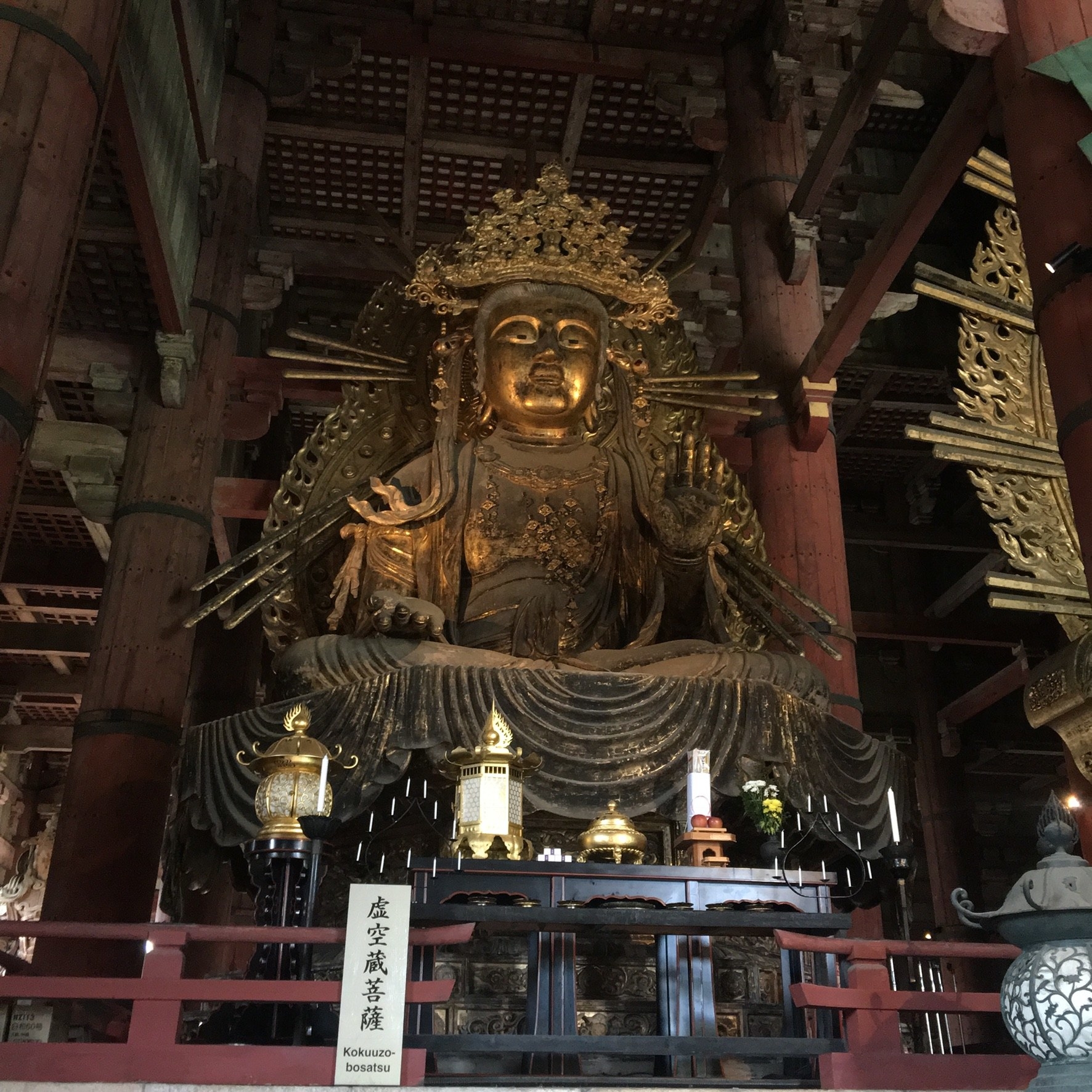 Large gold buddha statue in a temple