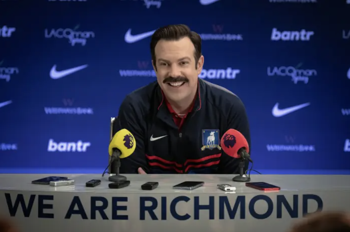jason sudeikis as ted lasso at a press conference