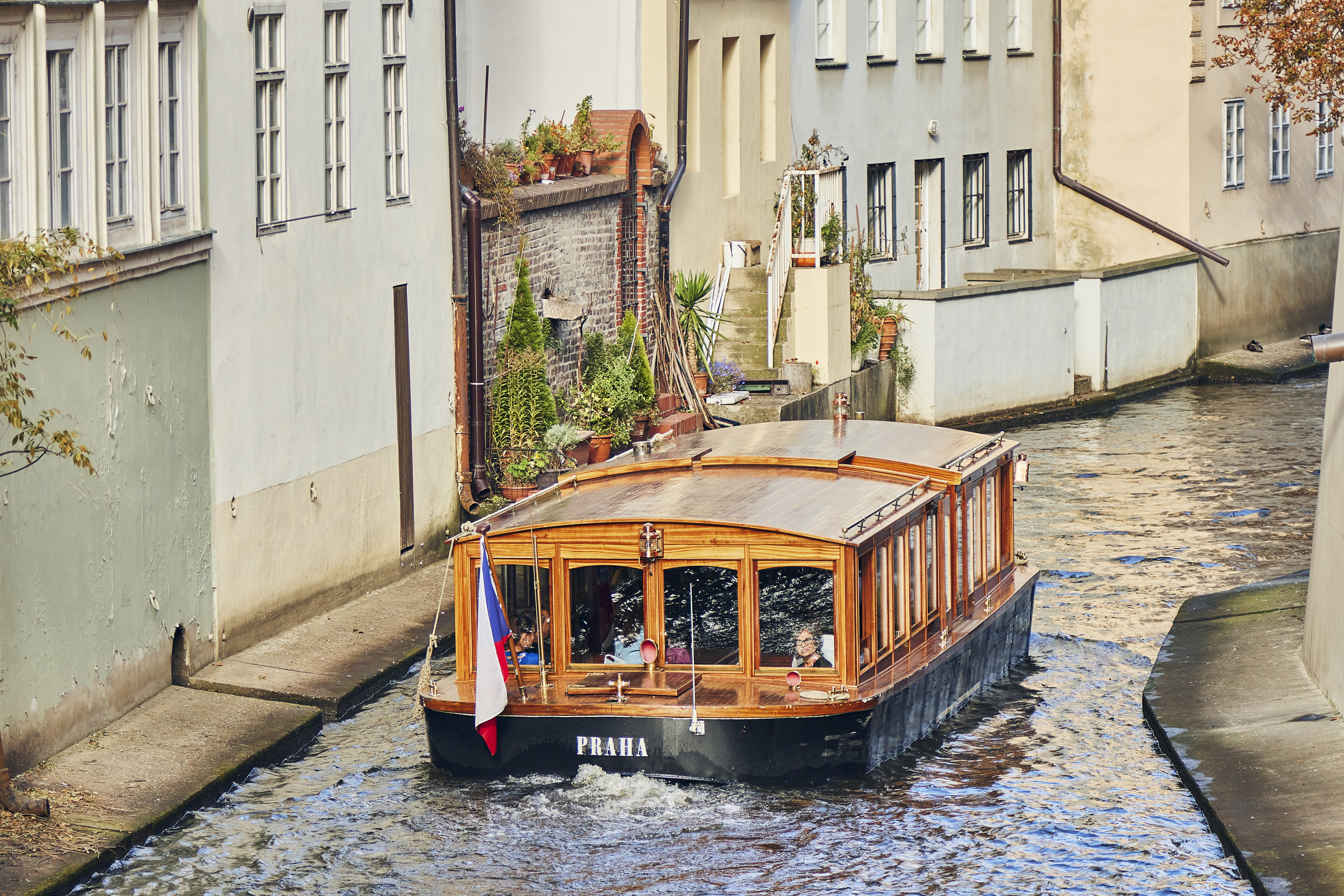 Pleasure ship Praha in the Canal Certovka, Devil&#x27;s Canal, also called Little Prague Venice in Prague.