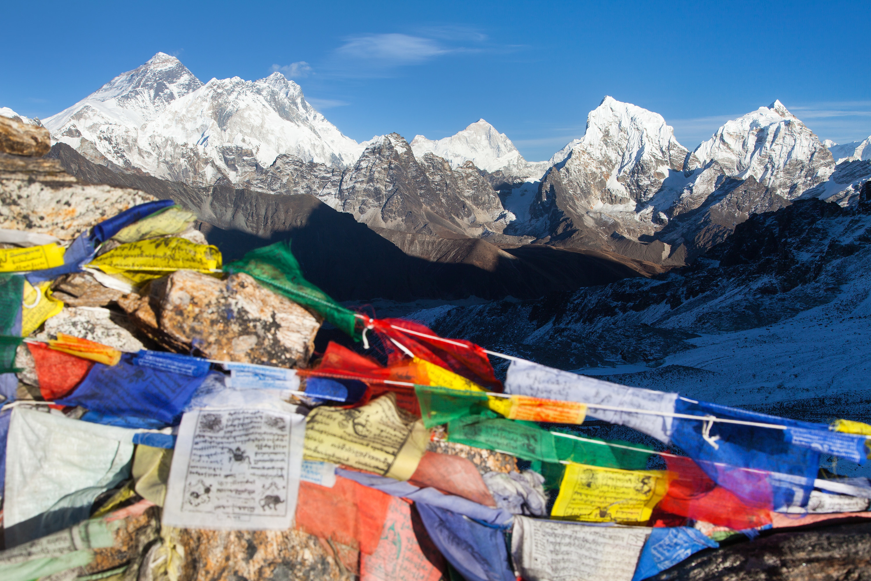 view of Mount Everest, Lhotse and Makalu with buddhist prayer flags, Mount Everest seen from Renjo La pass - Nepal himalaya mountain, Khumbu valley