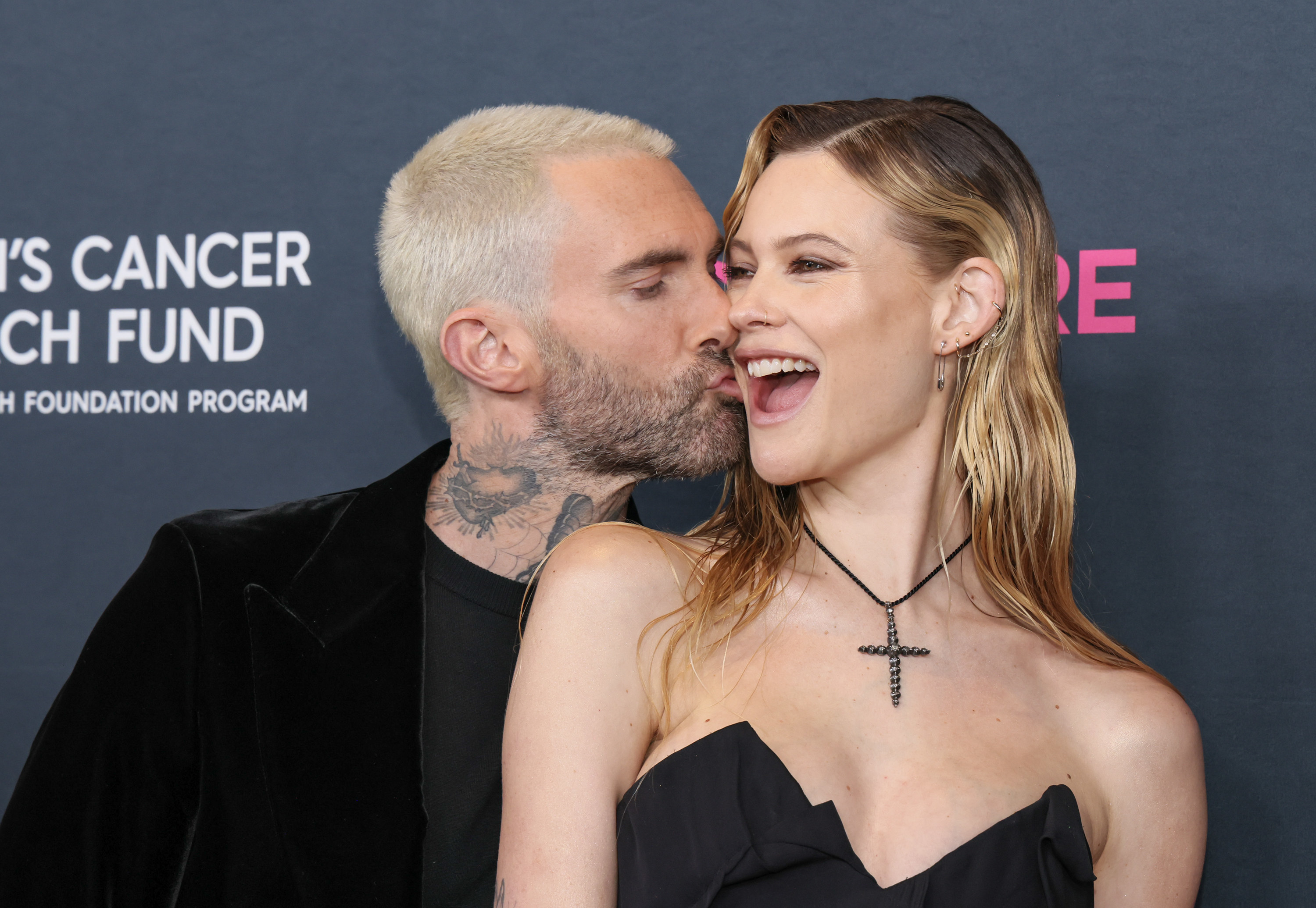 Adam kissing Behati&#x27;s cheek