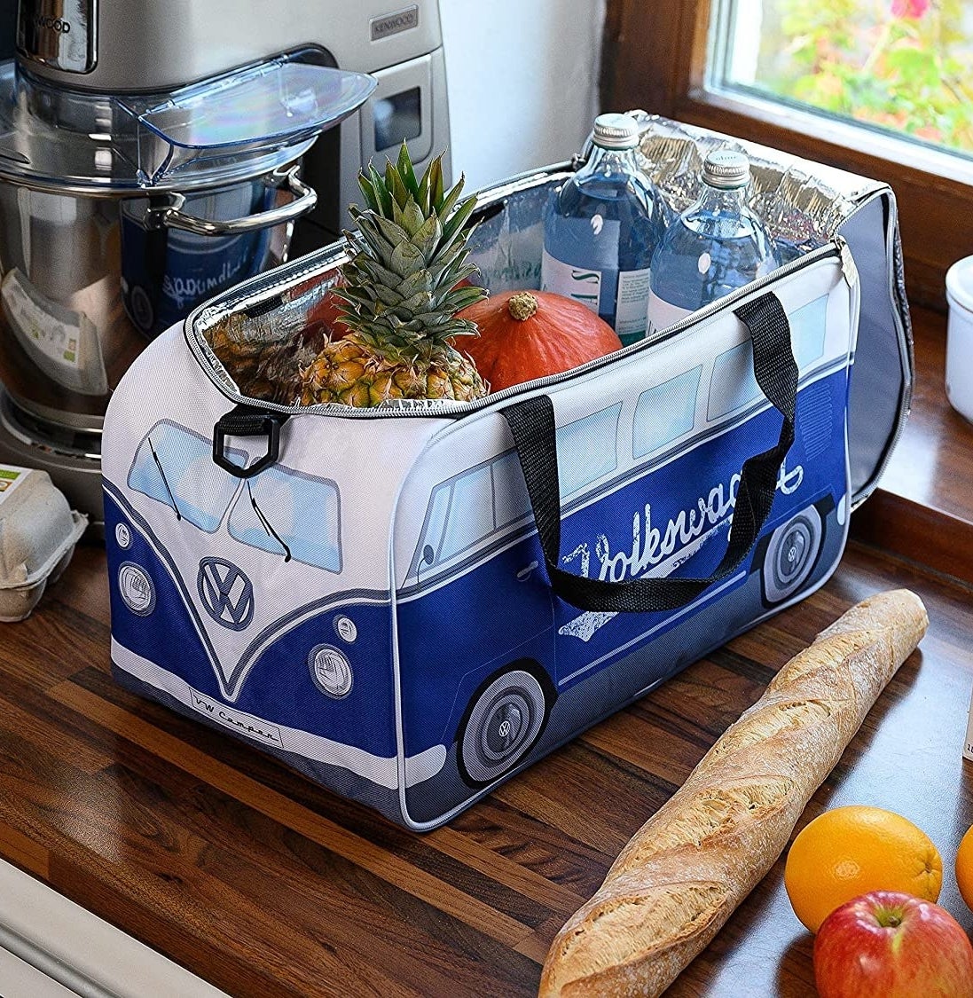 the cooler on a counter with food in it