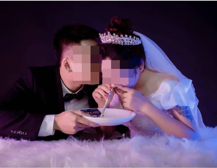 A bride and groom snorting lines from a plate