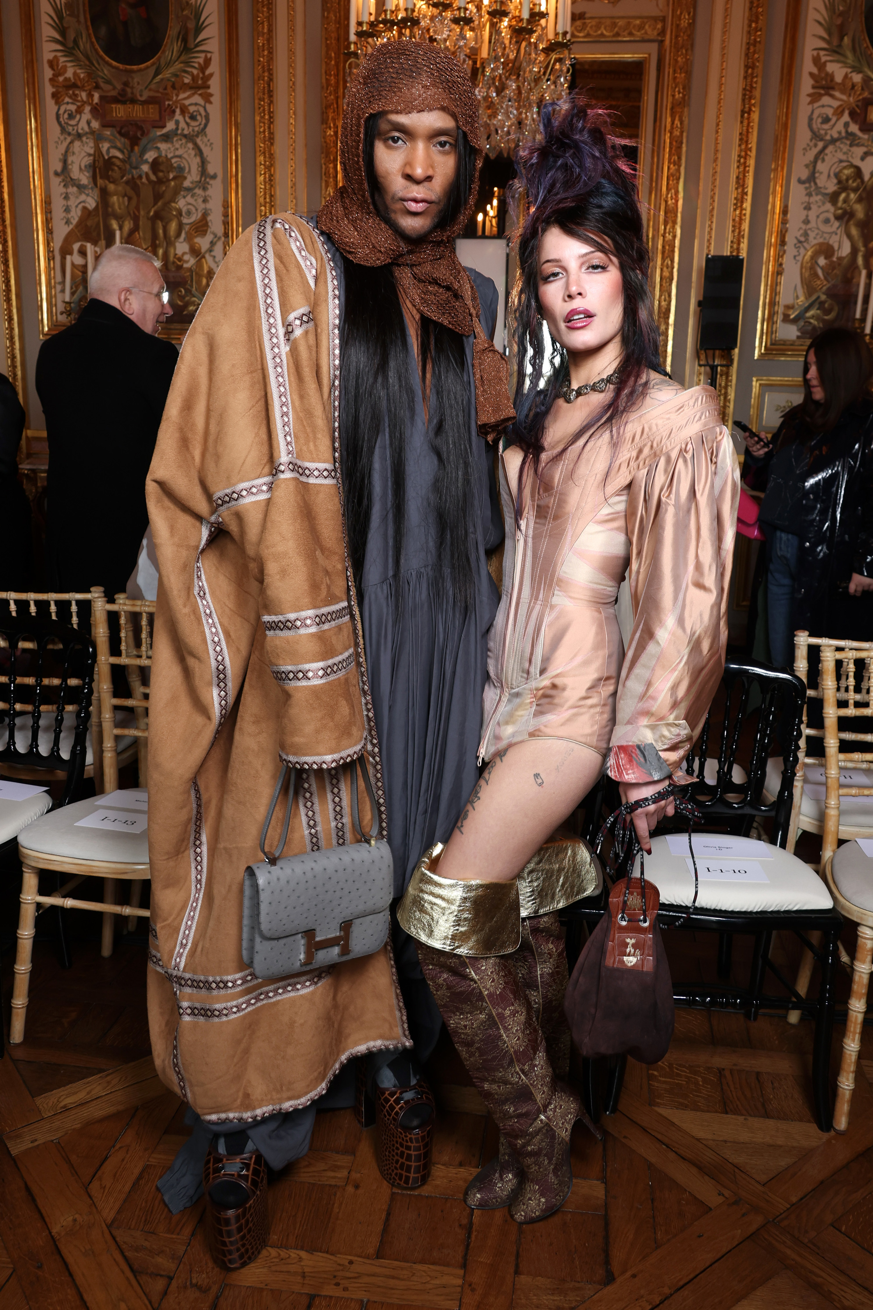 Law and Halsey pose together for a photo at a fashion show