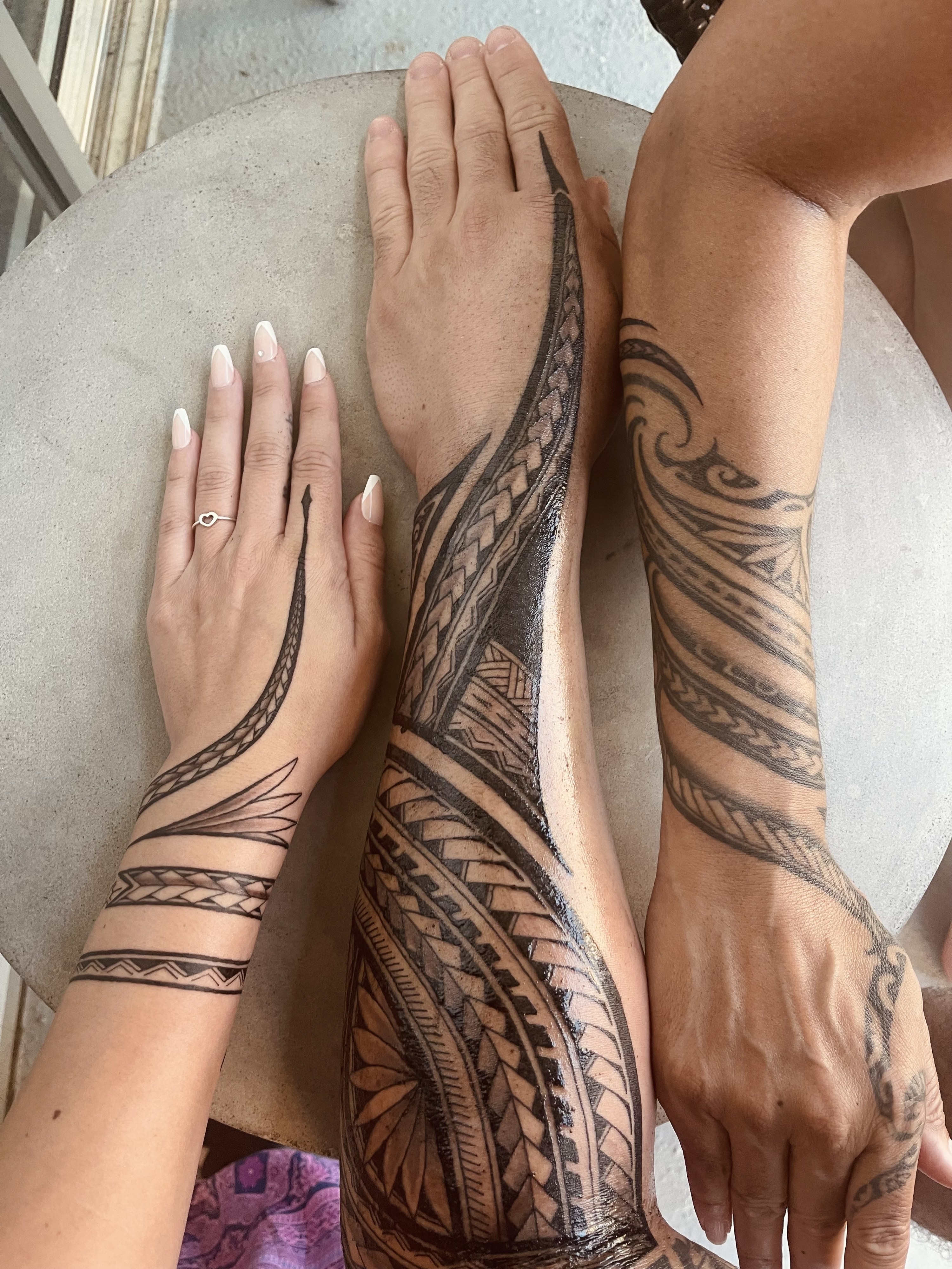 Tattoos on hands and arms
