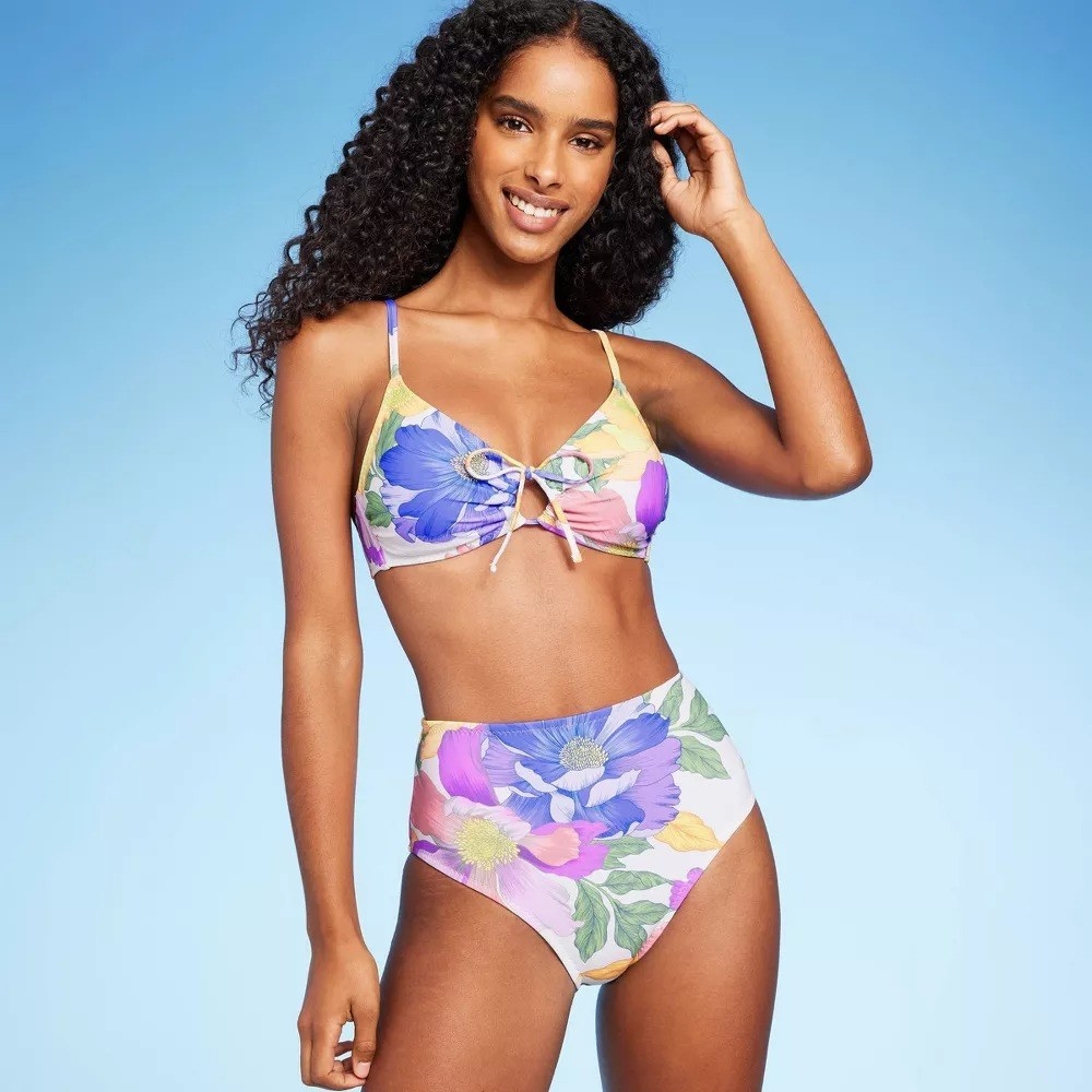 Image of model wearing floral bathing suit