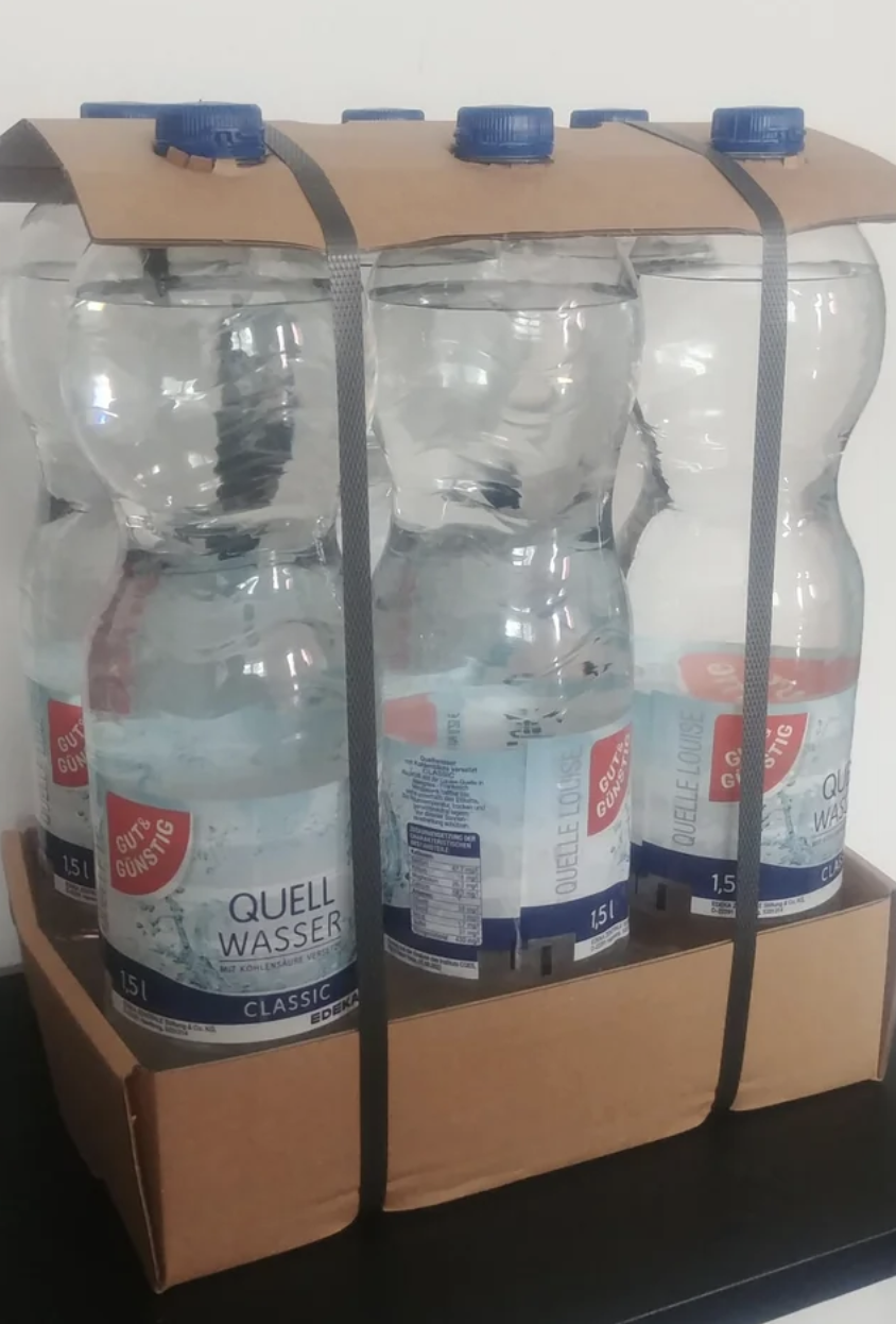 bottles held together with cardboard