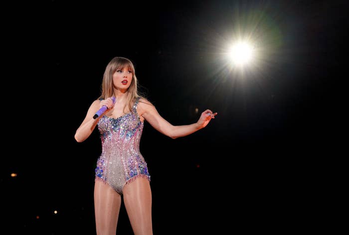 taylor in a colorful sequenced one-piece