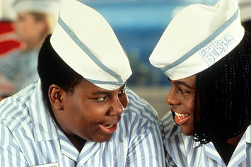 Kenan Thompson and Kel Mitchell smiling in a scene from the film 'Good Burger'