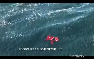 A survival suit floating in the ocean with no one in it
