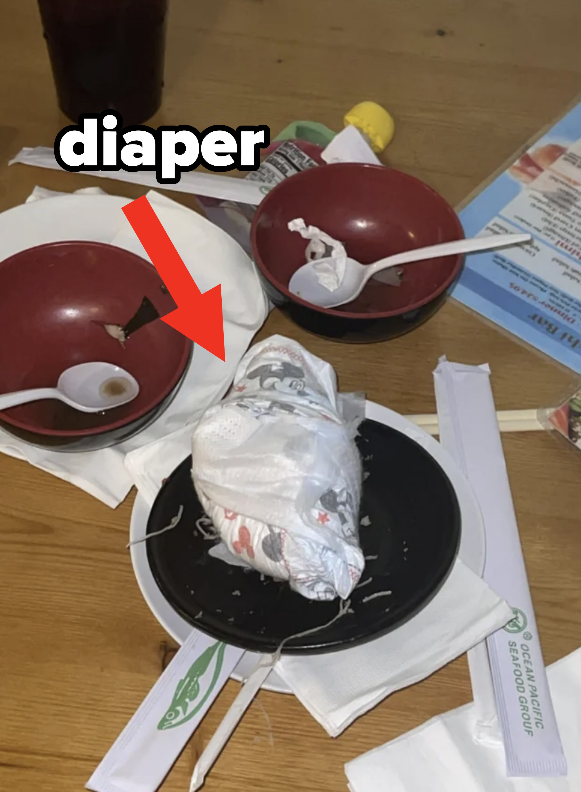 A diaper left on a restaurant table