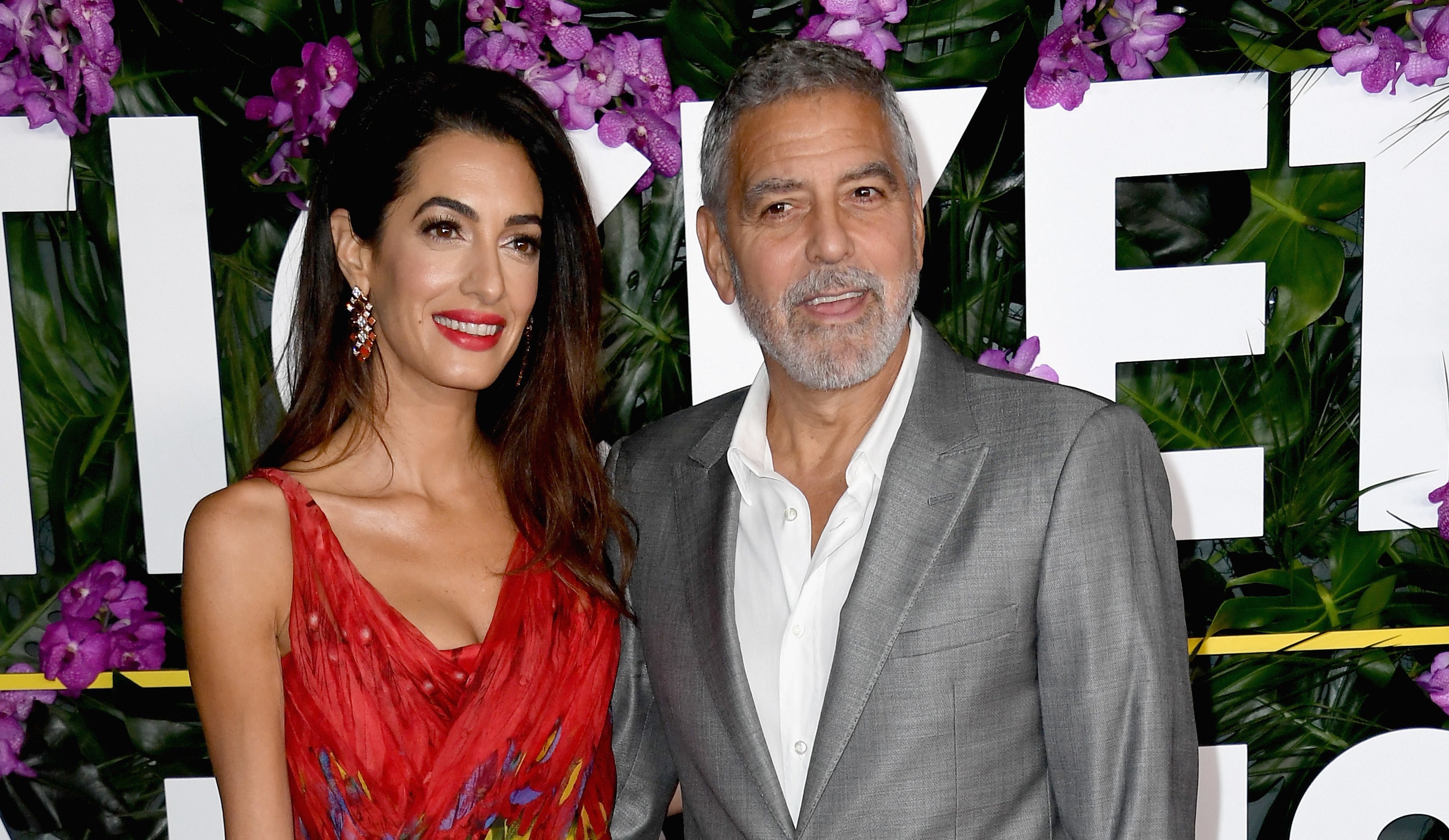 George Clooney and wife Amal at a red carpet event