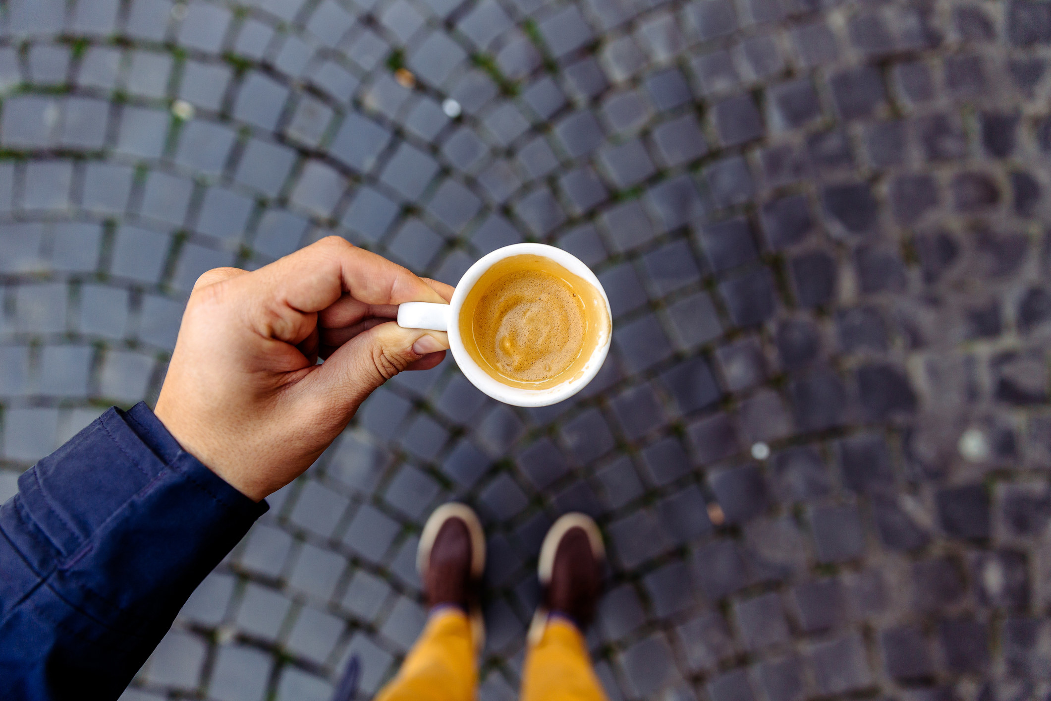 Drinking espresso on the cobbled streets of Rome.