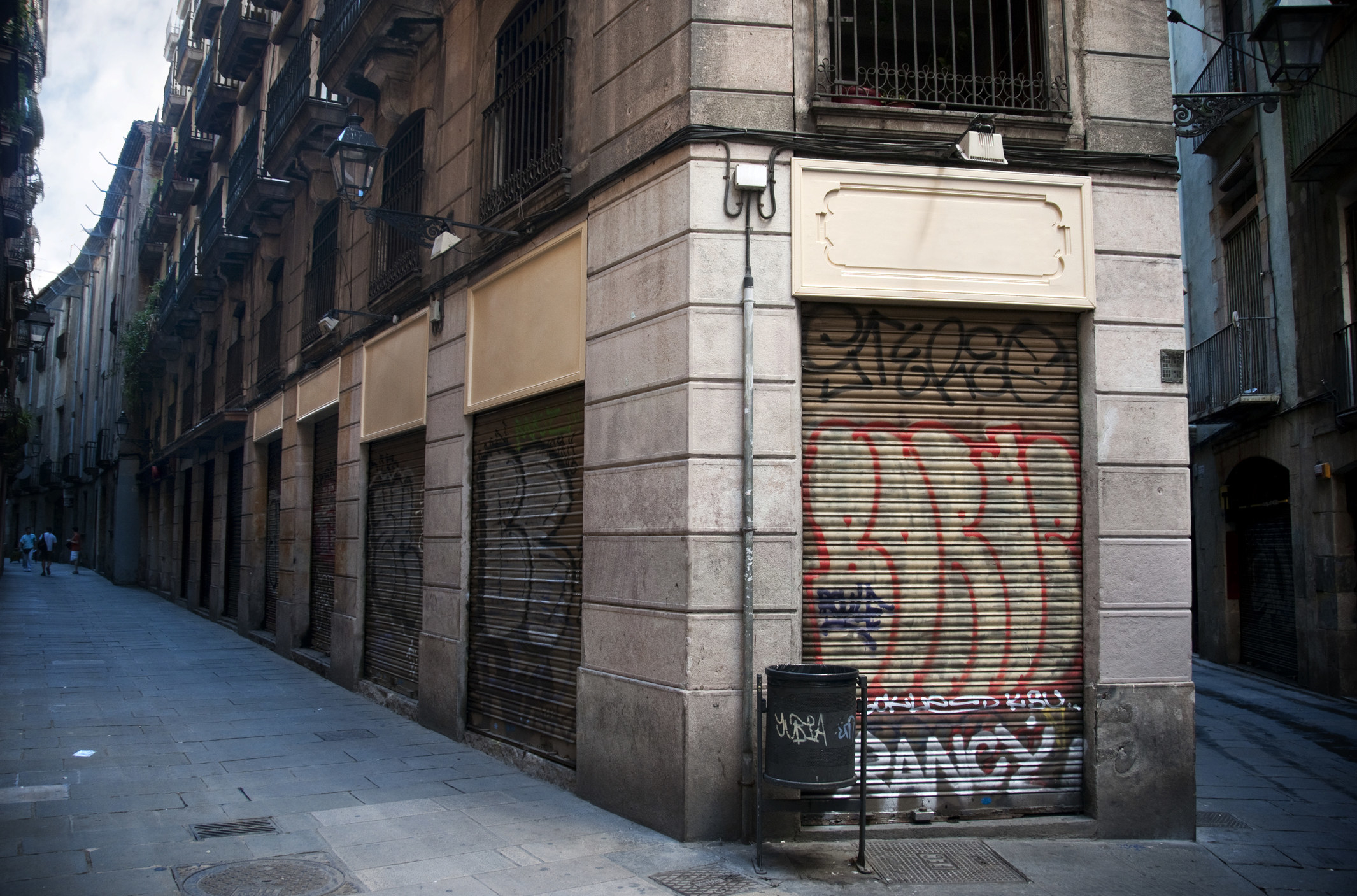 Closed storefronts in Barcelona.