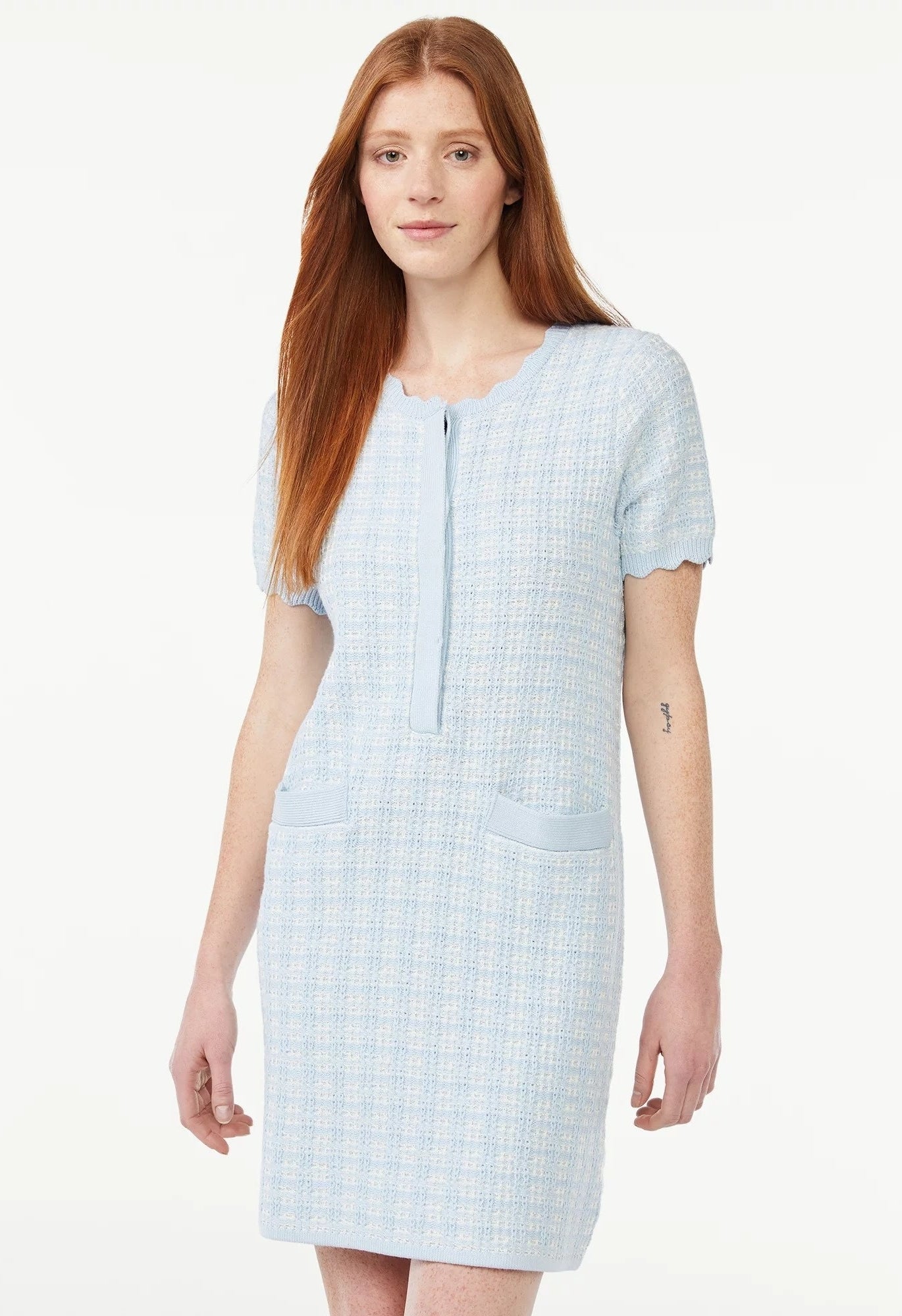 Model wearing short sleeve tweed mini dress in blue and white pattern