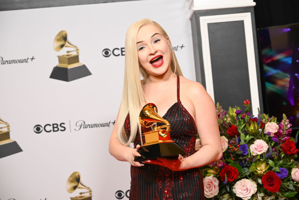 Kim holding a Grammy