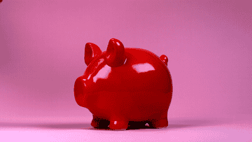 a piggy bank getting smashed