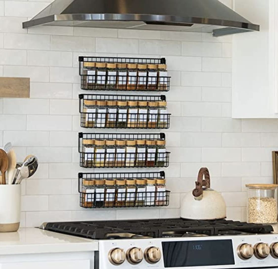 the spice rack hanging over the stove