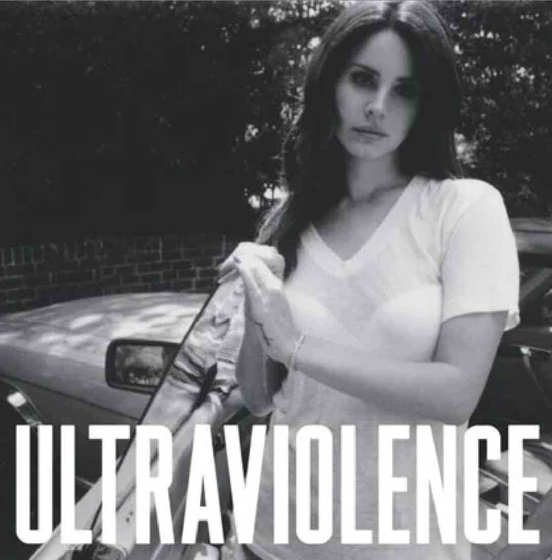 cover for &quot;ultraviolence&quot; wear she wears a v-neck t-shirt and leans on an open car door