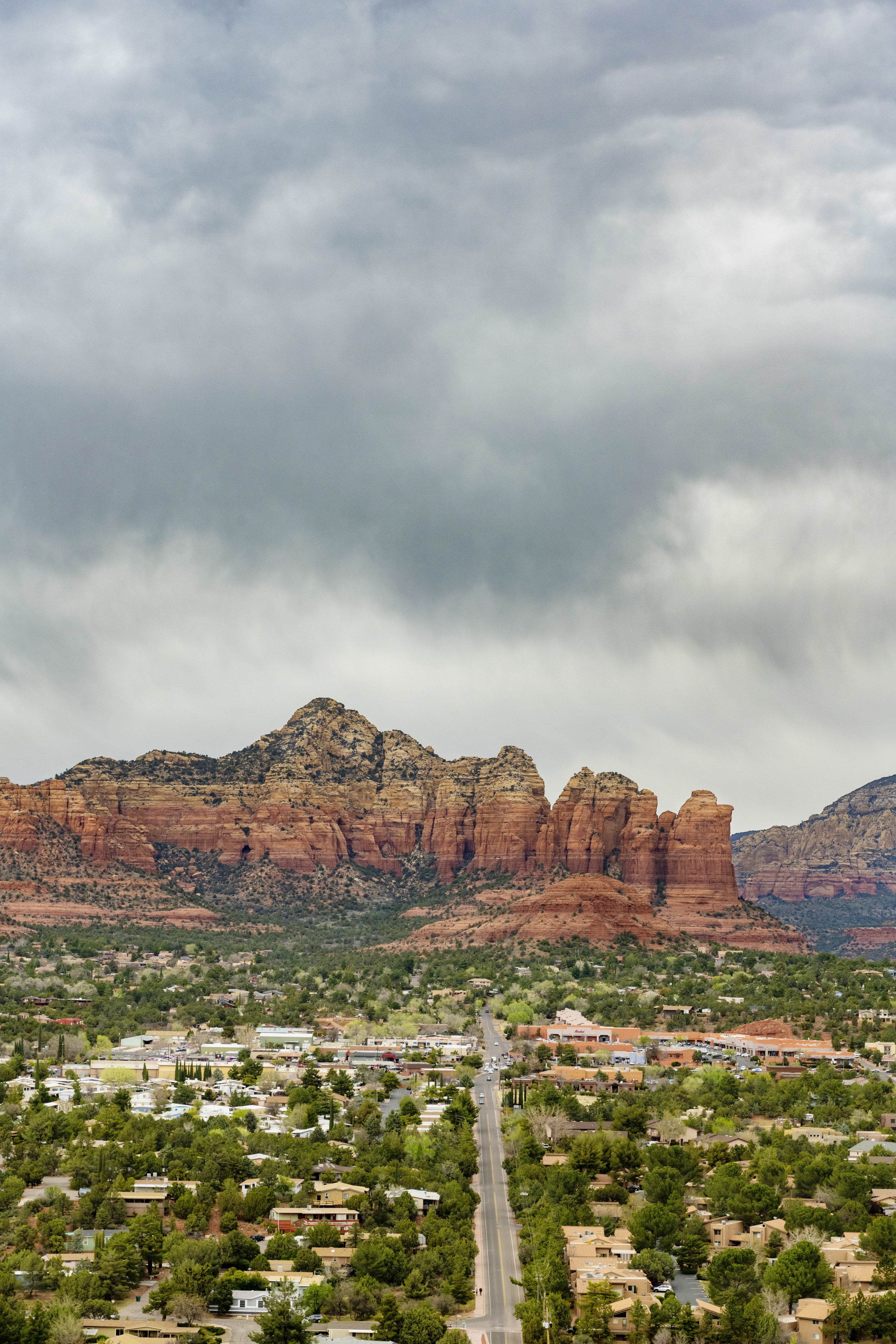 This is a high-angle photograph of a residential neighborhood in the town of Sedona, Arizona in spring time