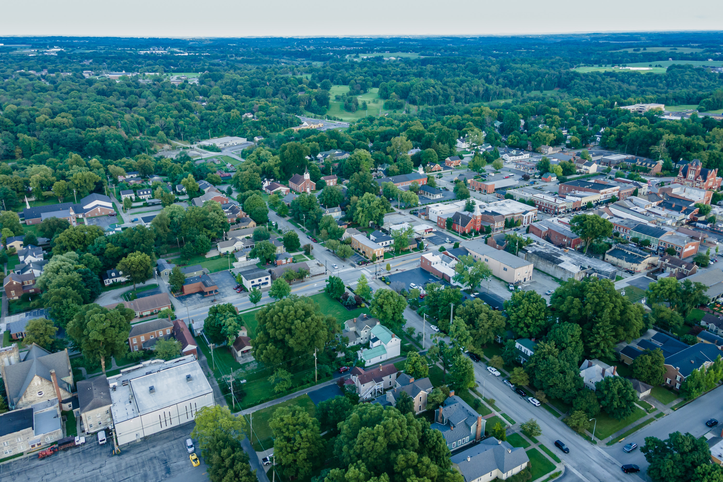 Adorable aerial view of the historic Bardstown, KY on a gorgeous sunny summer evening with a few clouds in the sky.