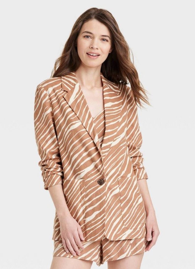 model wearing zebra print blazer