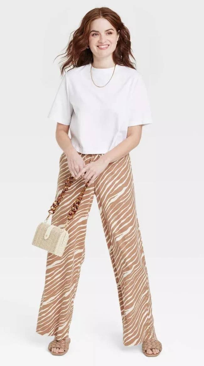 model wearing zebra print linen pants