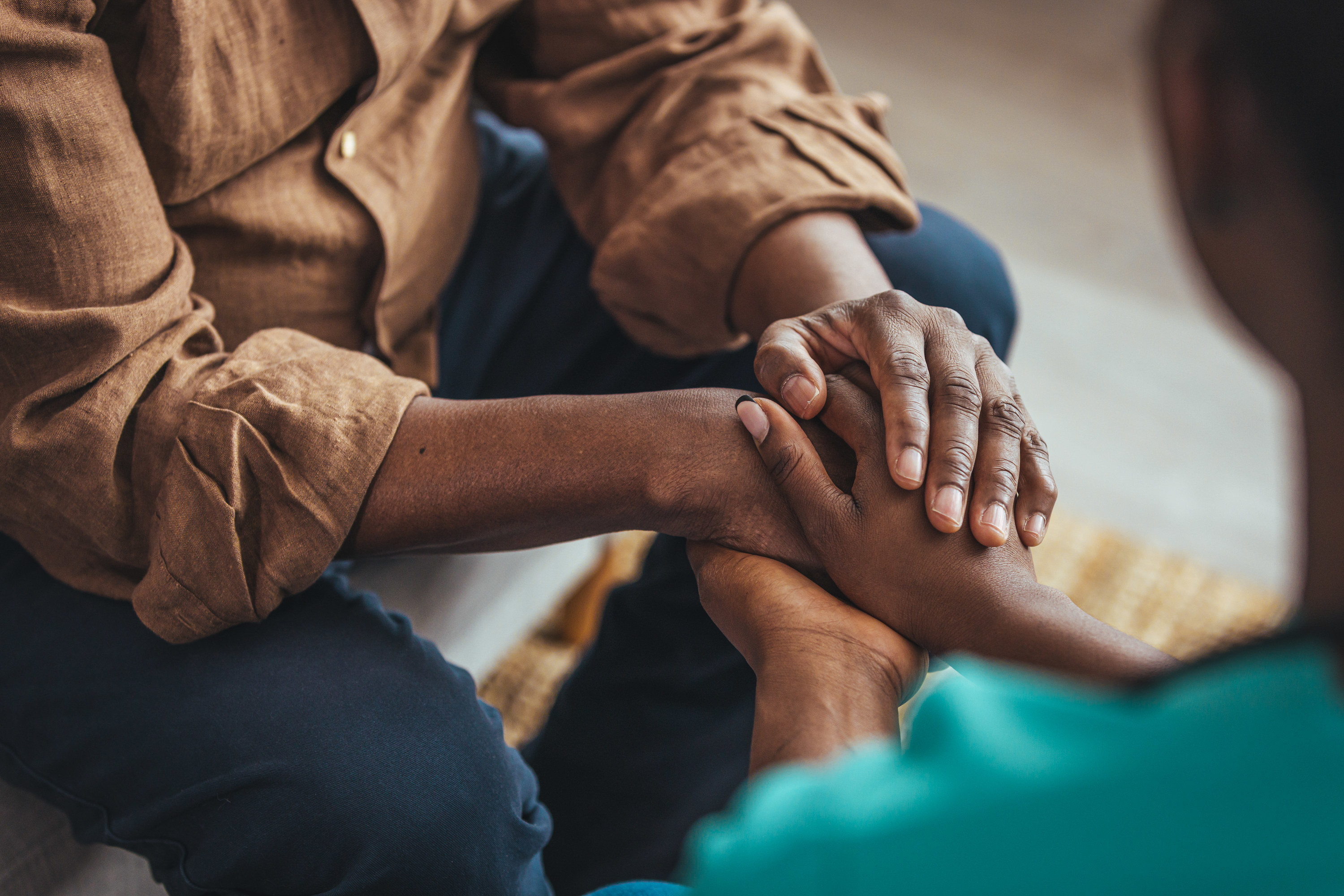 two people holding hands