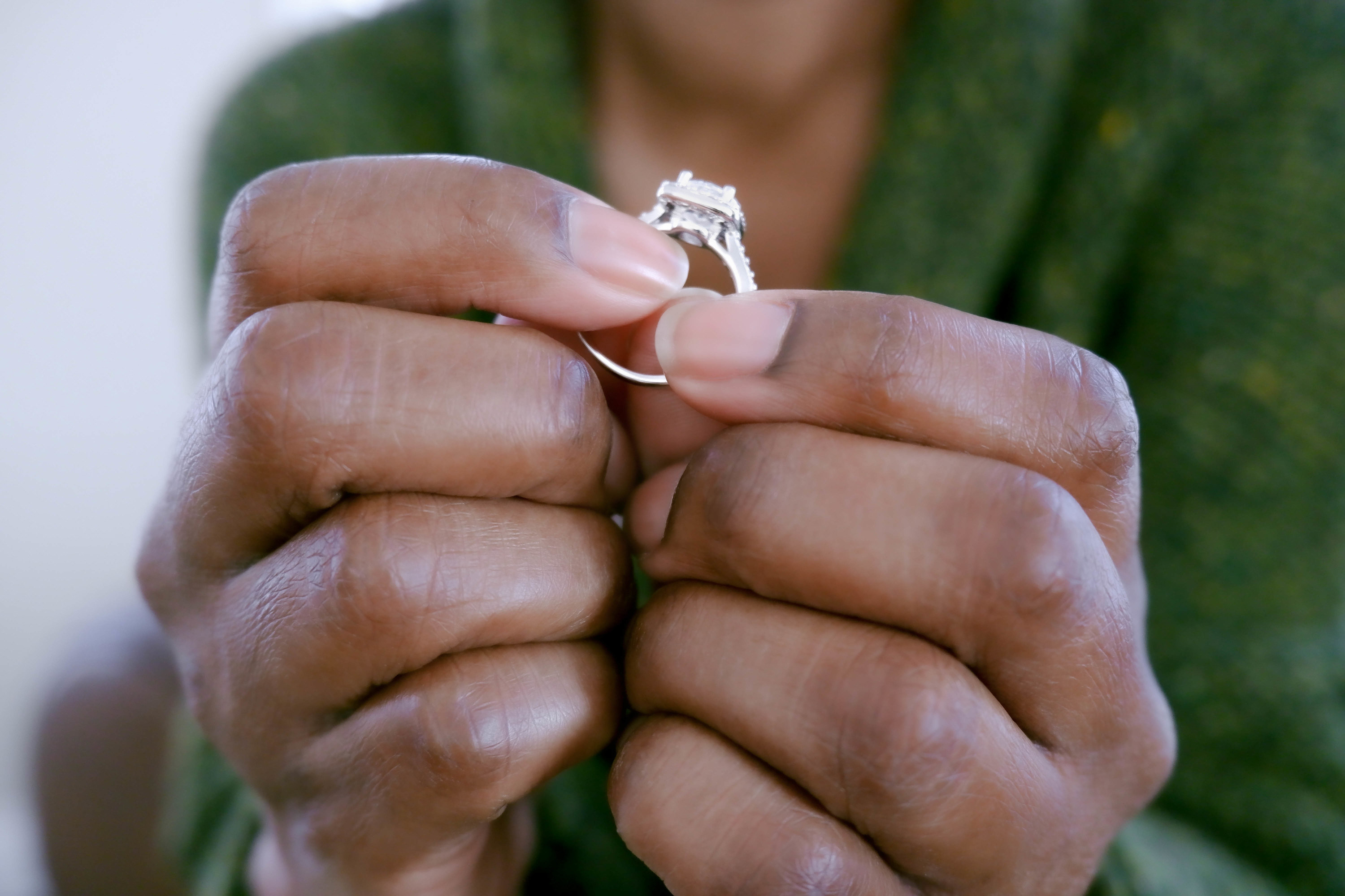 Close-up of unrecognizable woman holding ring