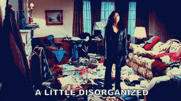 woman gestures to messy room and says &quot;a little disorganized&quot;