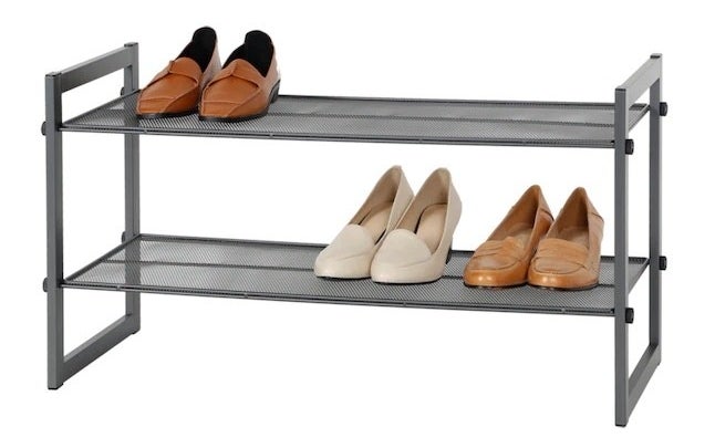 The shoe rack with some shoes on it