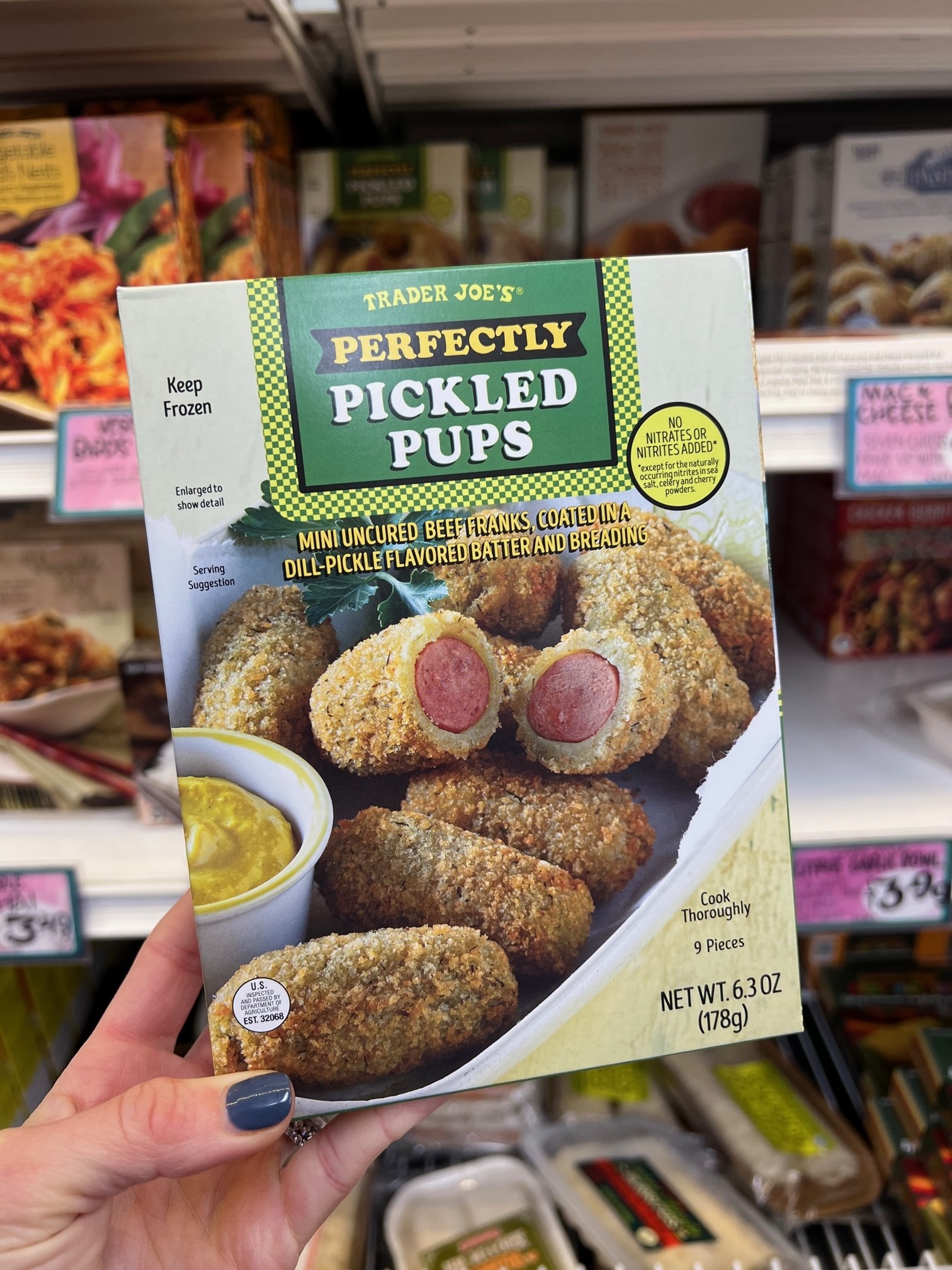 A box of Perfectly Pickled Pups: &quot;mini uncured beef franks, coated in a dill-pickle flavored batter and breading&quot;