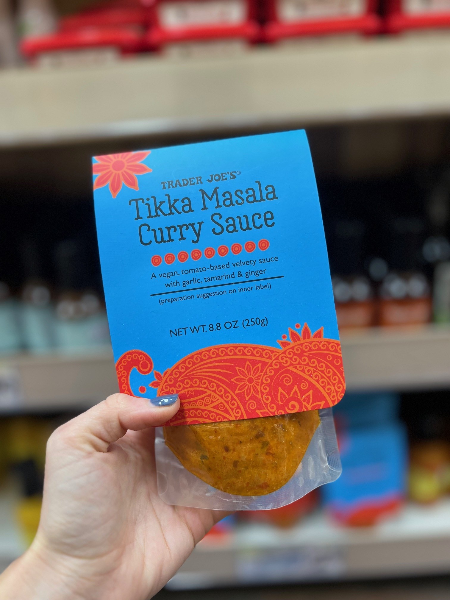 A package of Tikka Masala Curry Sauce: &quot;a vegan, tomato-based velvety sauce with garlic, tamarind &amp;amp; ginger&quot;
