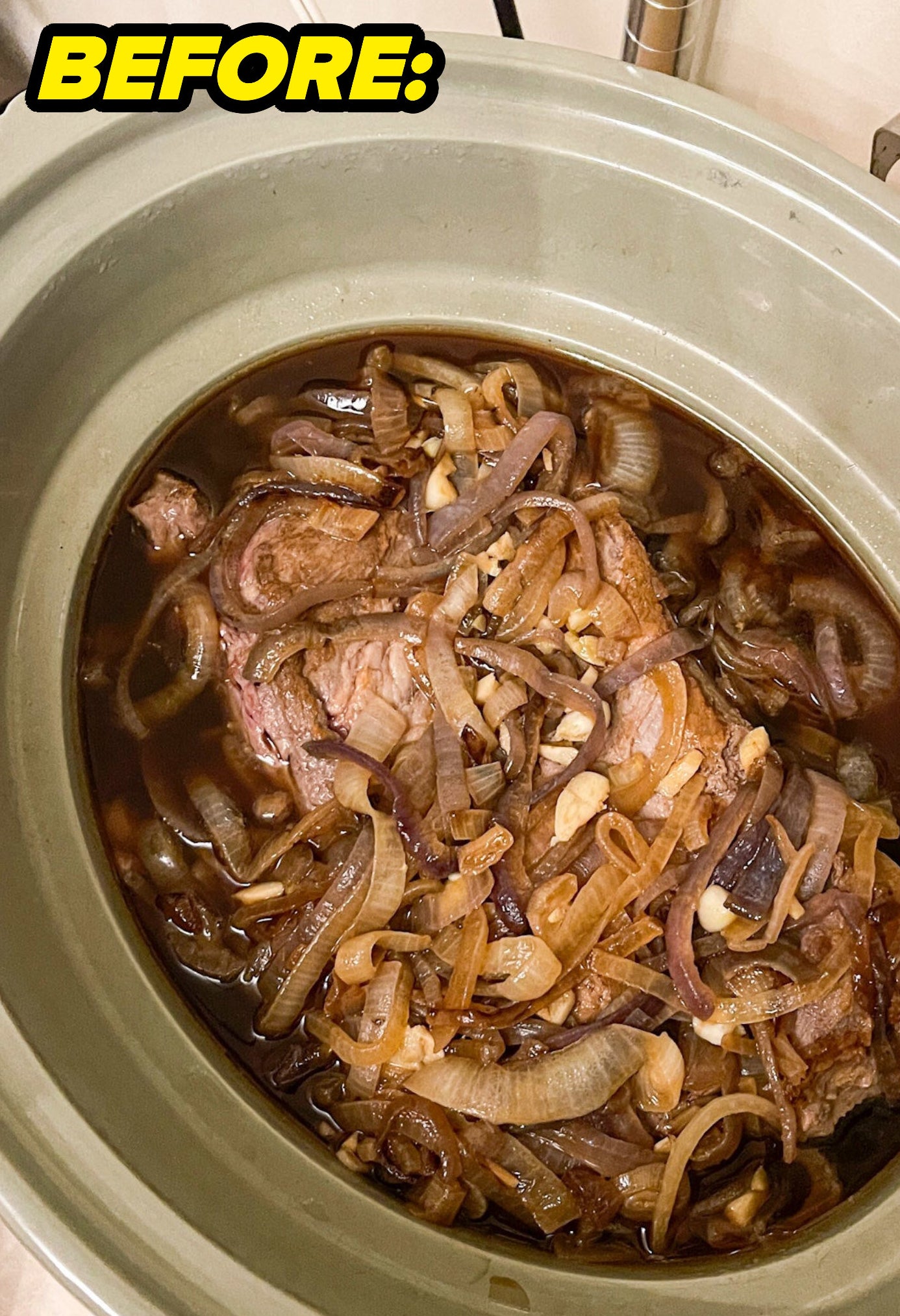 Before: onions on top of a brisket in the slow cooker