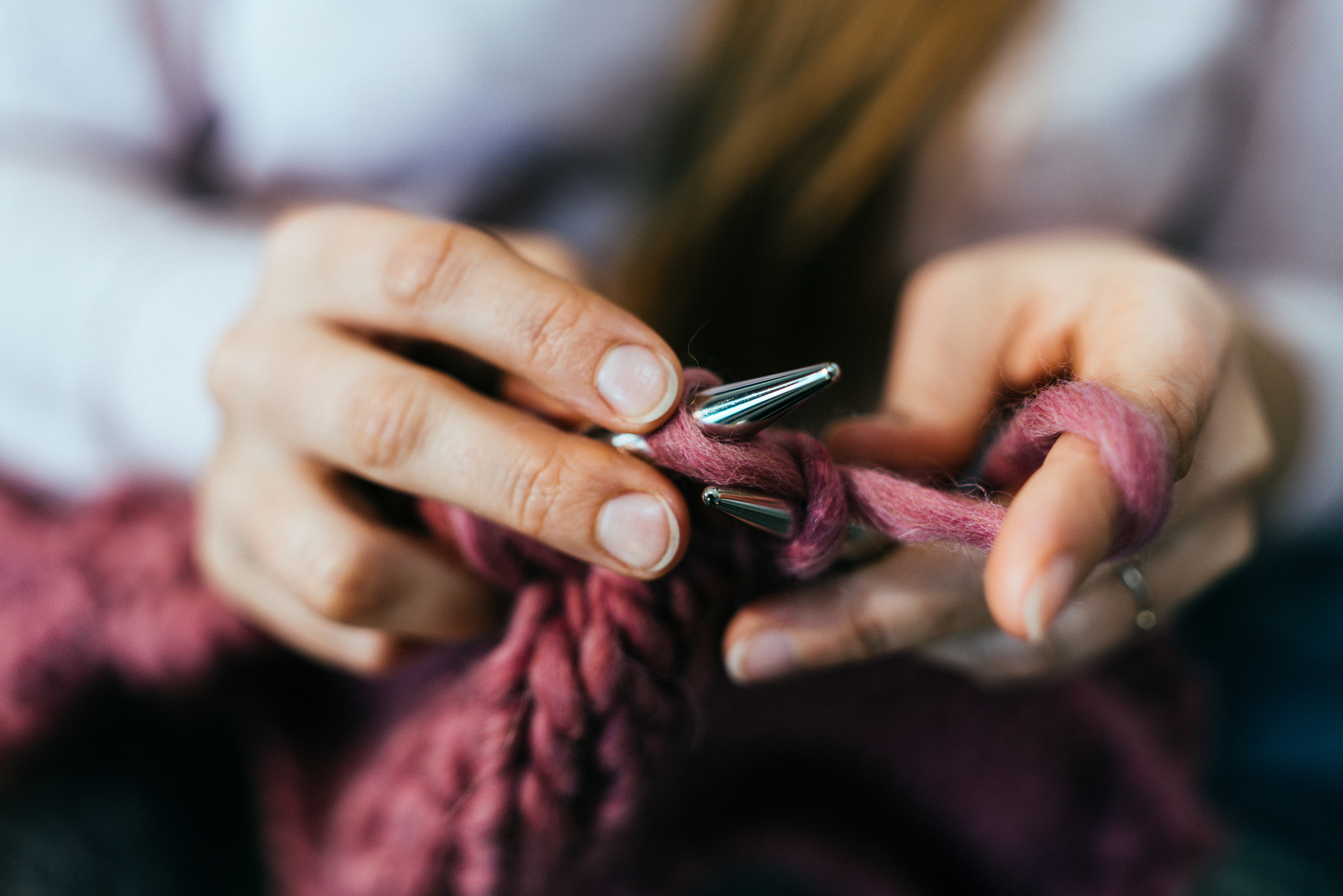 hands knitting something