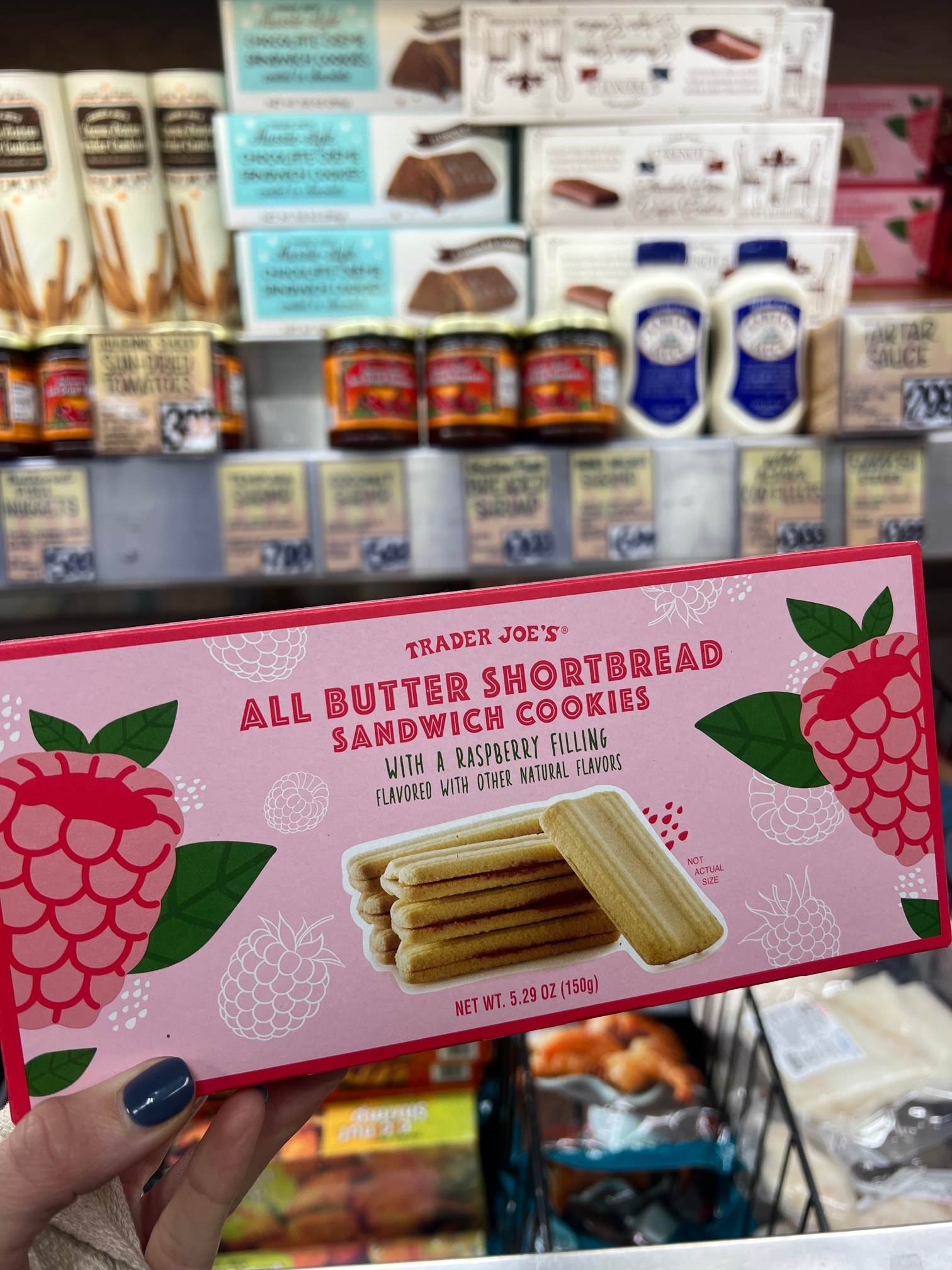 A package of All Butter Shortbread Sandwich Cookies With a Raspberry Filling