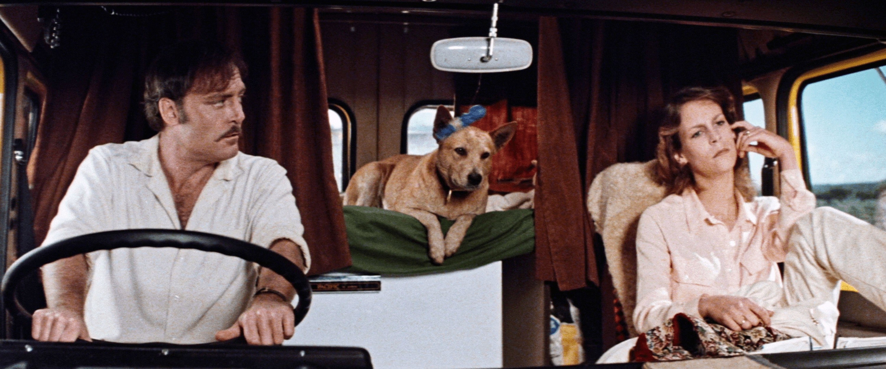 Stacy Keach, Jamie Lee Curtis and a dog ride in a truck