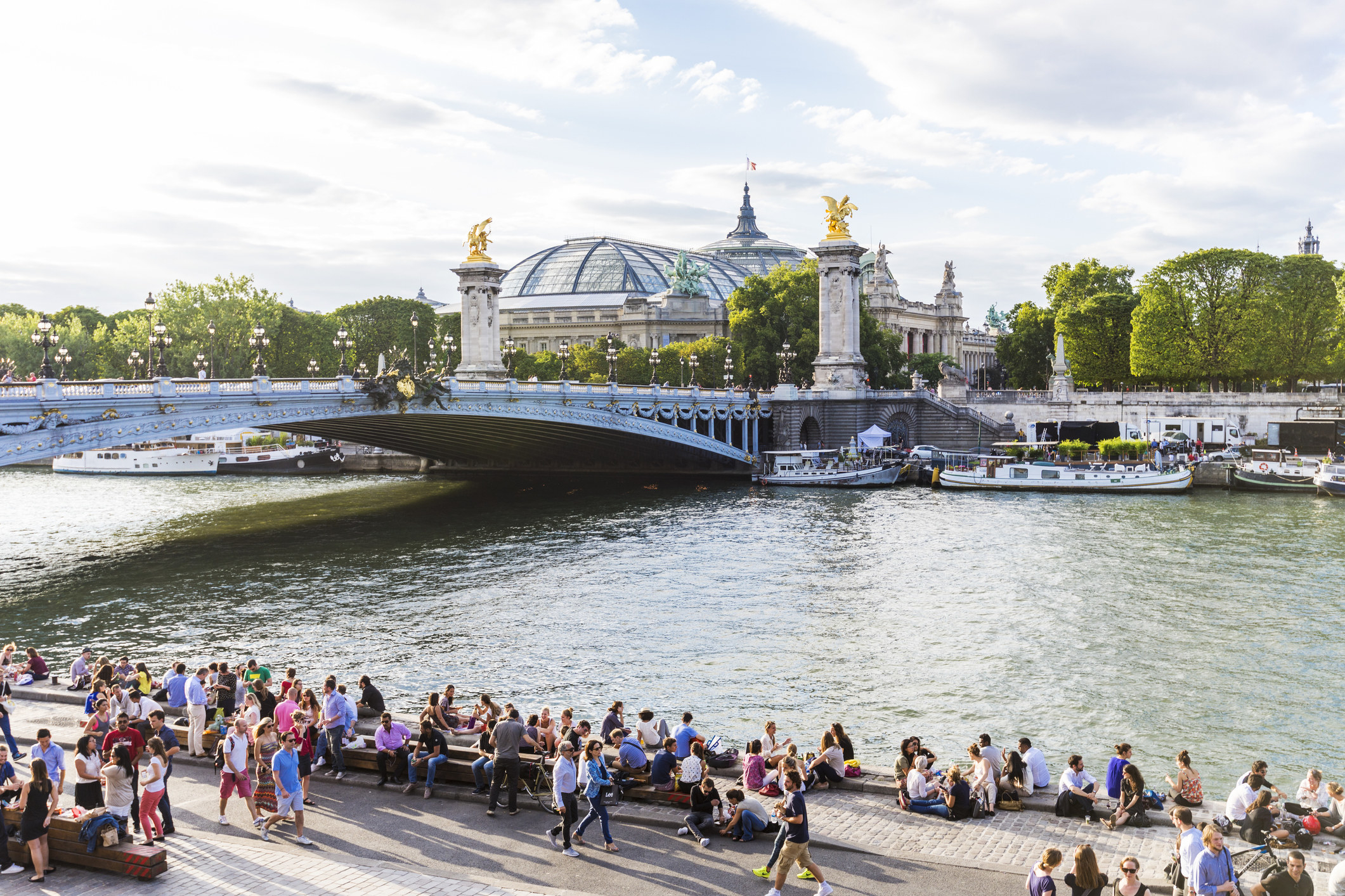 People walking along the Seine