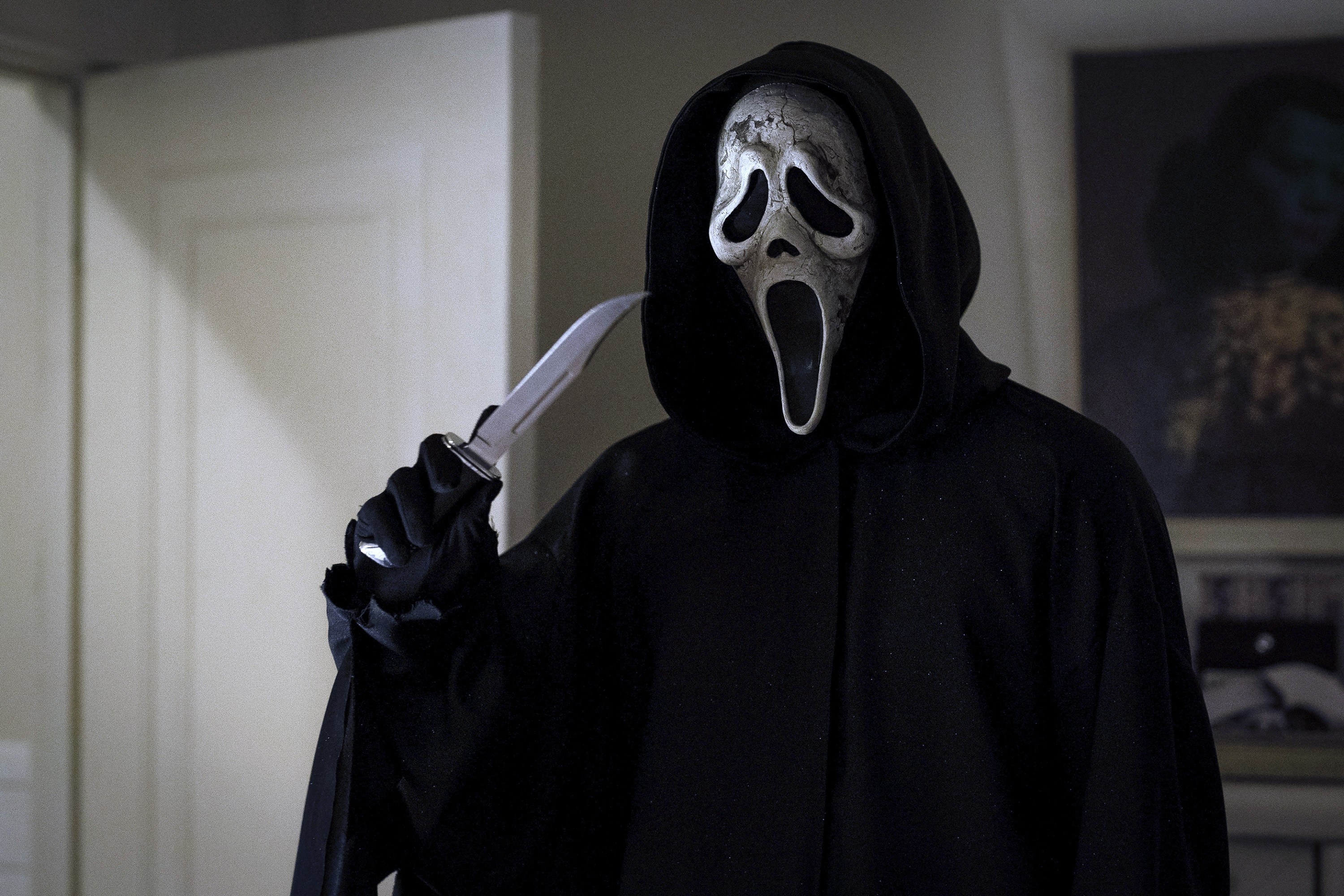 Ghostface holds a knife