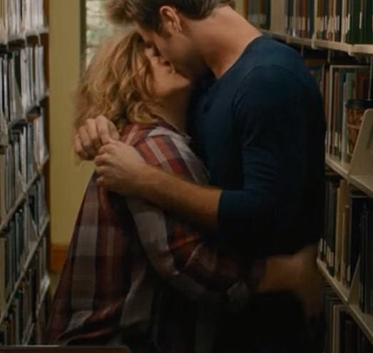 Melissa making out with her costar in a library