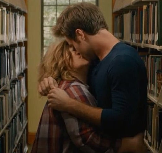Melissa making out with her costar in a library