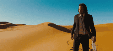 john wick wandering through the desert