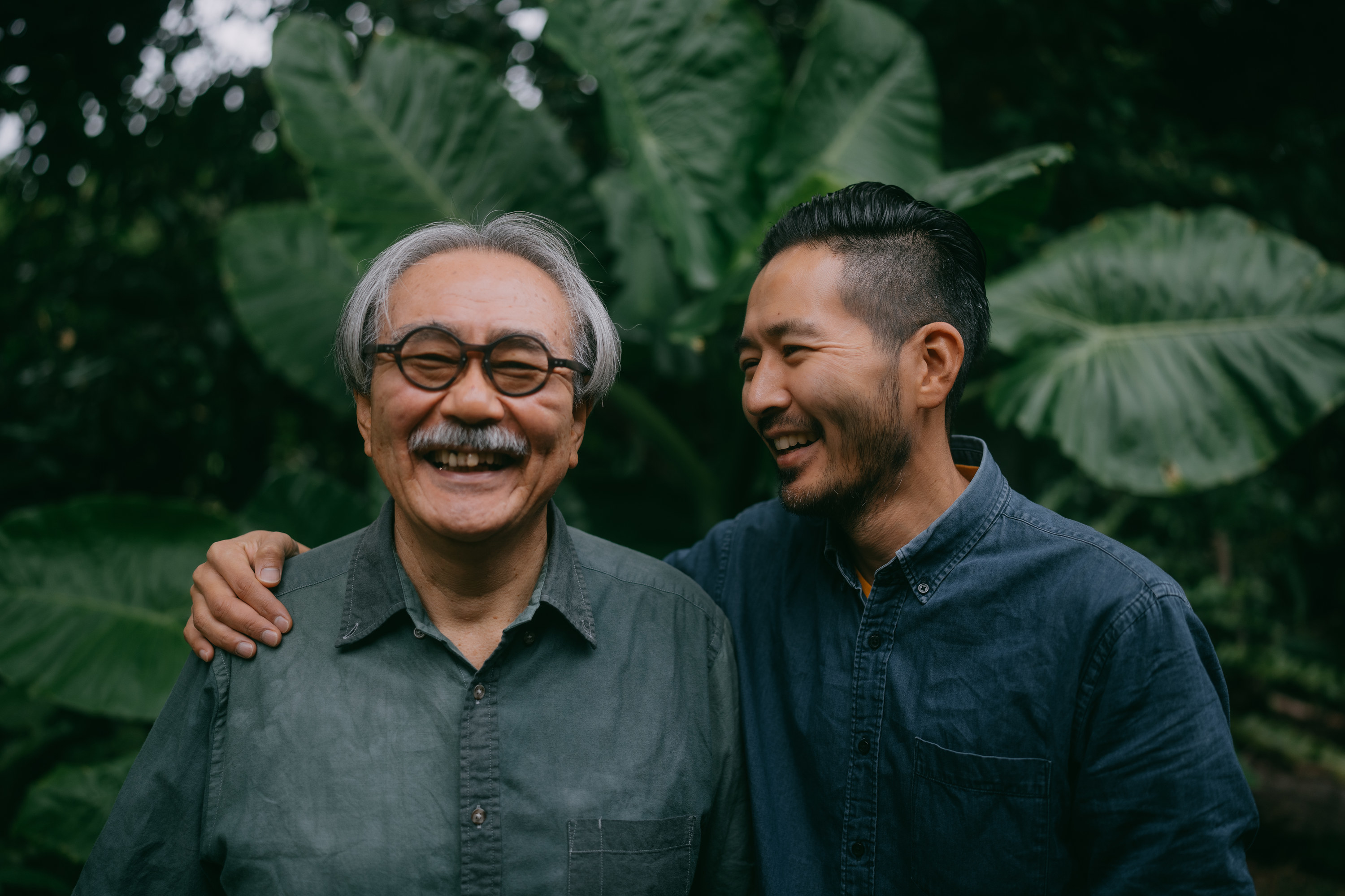 Son and father hugging outside