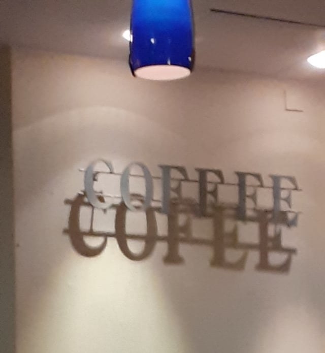 The word &quot;Coffee&quot; but the shadow is missing an &quot;F&quot;